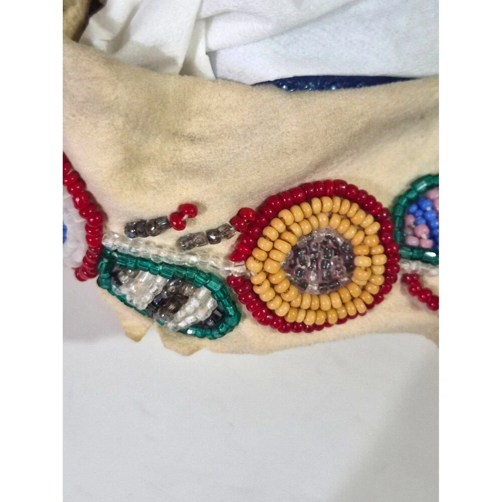 Vintage Crow Beaded Hide Moccasins featuring Intricate Colorful Glass Beadwork
